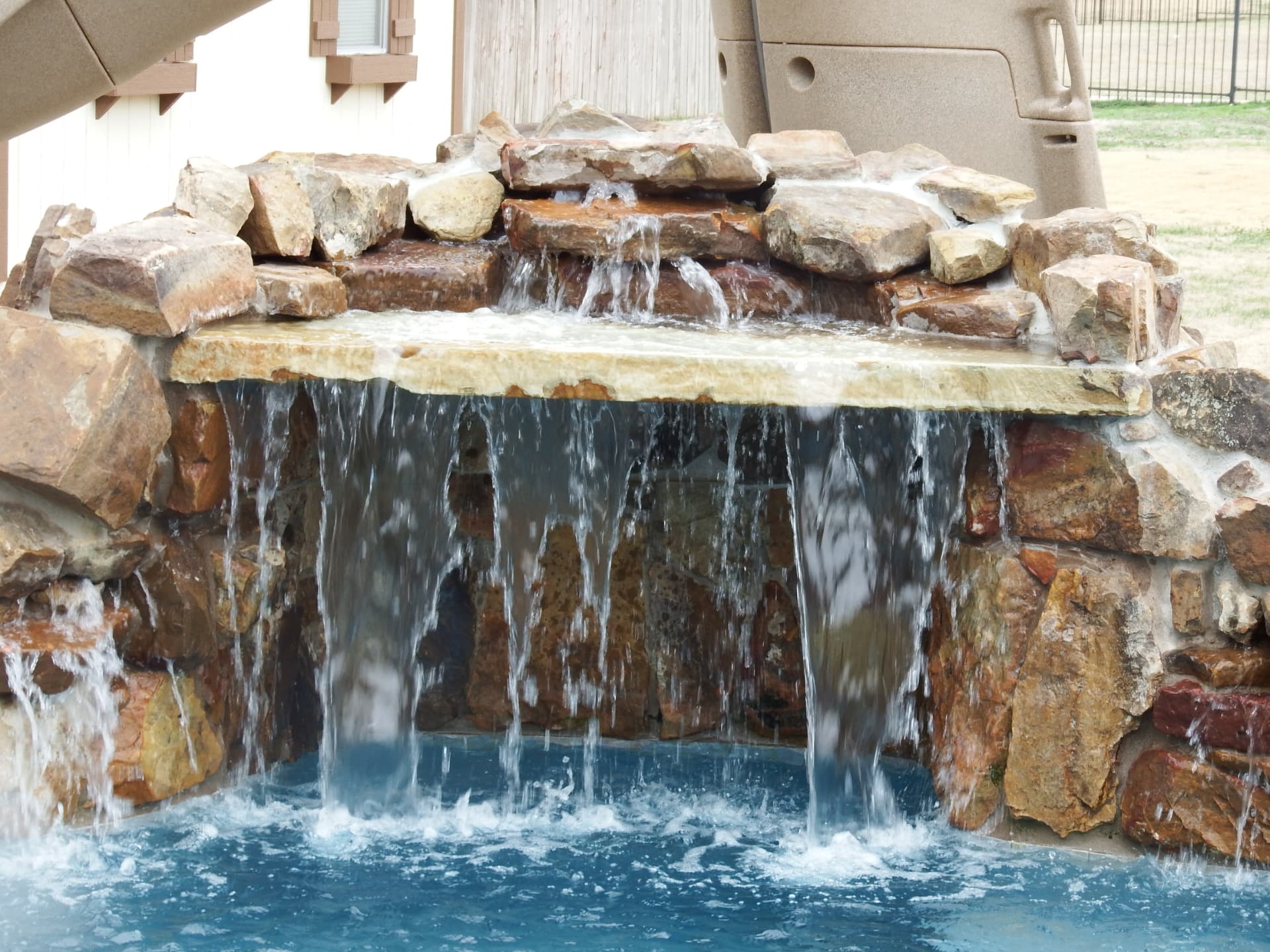 Hand-stacked grotto waterfall